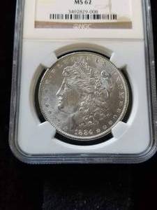 1884-O MORGAN SILVER DOLLAR MS62 NGC