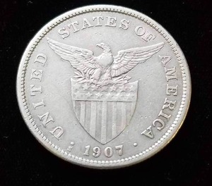 1907 PHILIPINES ONE PESO SILVER (MORGAN DOLLAR SIZE)