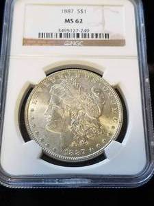 1887 MORGAN SILVER DOLLAR MS62 NGC