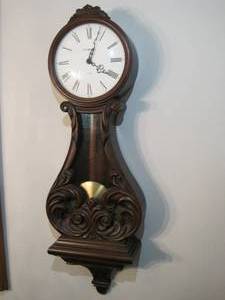 lot 9 image: Howard Miller Wall Clock. 