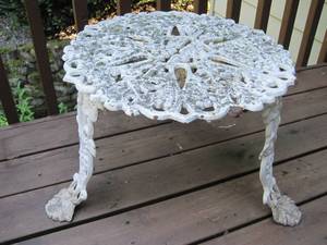 lot 28 image: An iron cast table from an 18th century antique design. 