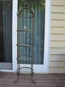 lot 34 image: Wrought Iron 4 Glass Shelf Plant Stand. 