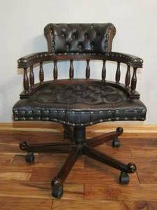 lot 36 image: Barrel Back Swivel Office Chair in leather. 