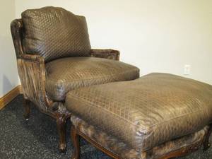 lot 65 image: Leather and Fur Armchair with matching Ottoman. 
