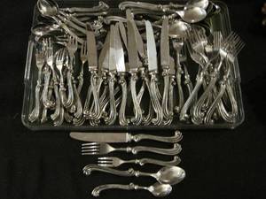 lot 91 image: 70 piece Pewter Flatware set for 12 settings. 