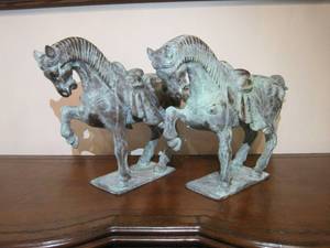 lot 97 image: A pair of Tang Dynasty Style Bronze Horses with Verdigris finish. 