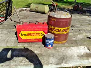 Vintage gas cans and oil can...