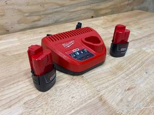 lot 21 image: MILWAUKEE M12 12-Volt Lithium-Ion Battery Charger with 2- M12 12-Volt Lithium-Ion Compact Battery Packs (1.5Ah)