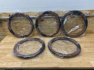 lot 77 image: NICEASY Lot of 5-  Steering Wheel Covers