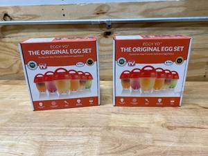 lot 43 image: EGGY YO Lot of 2-  Hard Boiled Egg Makers 5 in 1 Egg Cooker Set with 6 Silicone Cups, Holder, Brush, White Separator, Timer - Make Hard Boiled Eggs Without the Shell - As Seen on TV Egg Boiler
