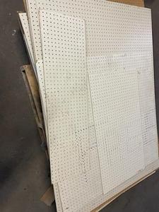 lot 23 image: 2 Pallets of pegboard and some meta...