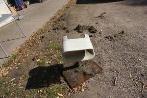 Folding Plastic Boat Seat on Pedestal Mounted On Plywood Base