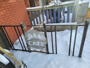 lot 87 image: Custom Grand Cafe Cast Iron Bike Stand