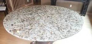 lot 5 image: Amazing Round Granite Top Rattan Pedestal Dining Table