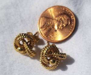 lot 97 image: 18K Yellow Gold Love Knot Stud Jacket Earrings