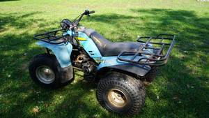 lot 4 image: Yamaha 200 Reverse Four Wheeler ---- Needs Head Gasket