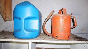 lot 21 image: Blue Five Gallon Kerosene Can & Red Five Gallon Gas Can
