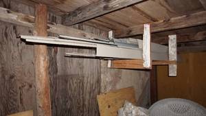 lot 38 image: Rack Of Metal Siding & Metal Brackets