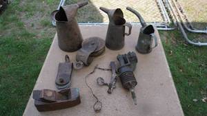 lot 70 image: Three Vintage Metal Oil Cans--Two Brown Crocks W Lids--Etc.