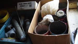 lot 83 image: Oil Spout--Miscellaneous Piping--Miscellaneous Steel--Coffee Cans Of Nails--Plastic Bolts--Reese Trailer Hitch  (2263)