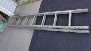 lot 132 image: 8 Foot Wood Extension Ladder--Extends To 4 Feet