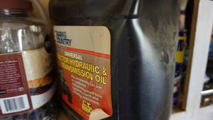 lot 158 image: Grease Gun-Oil Can-Antifreeze-WD 40-Tractor Hydraulic Transmission Fluid-Buckets Full Of Door Knobs-Screws-Hinges-Battery Charger-Window Washer & Squeegee (NEW)