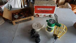 lot 182 image: Super Charger Solid State Electric Fencer--Model 909--Assortment Jewel Mount Containers-Four Casters-Work Light Frame-Miracle Grow Garden & Lawn Feeder
