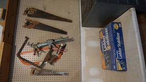 lot 221 image: Quick Click Werner Ladder Stabilizer--Three Hand Saws--Two Caulking Guns--Buck Saw