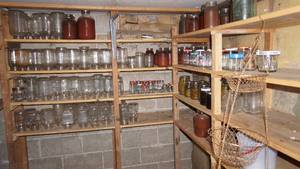lot 267 image: Wood Shelves Filled With Jars-Some Jars Filled With Canned Items-Three Tier Wire Hanging Fruit Basket