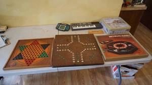lot 275 image: The Original Star Checkers (1938)--Michigan Rummy--Ten Family Game Center--Hand Held Monopoly Game--Casio Keyboard
