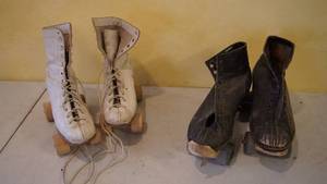 lot 280 image: Two Pair Of Vintage Roller Skates--Ladies-White-Sz.4---Mens Black-Sz. 7