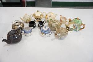 Teapots and cream and sugar sets
