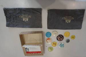 Commemorative buttons, cigar box and bags