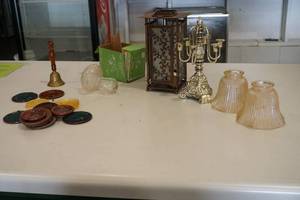 Bell, candle holder, furniture slides, lantern and rooter