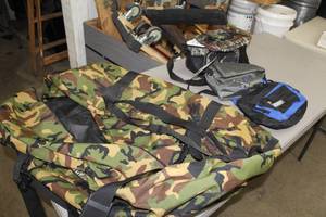 lot 1158 image: Lot of (4) Bags  - Camo Soft Side Cooler, Long Camo Bag, Blue Bag, Silver Bag