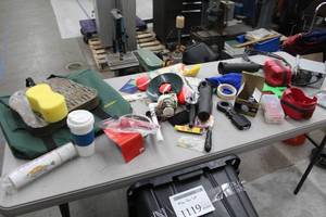 lot 1119 image: Lot of Misc  - Cabelas Bag, Camo Seat Cushion, Sponge, Rod Holders, Fishing Tackle and Gear, Berkley Handheld, Fish Scale and much more