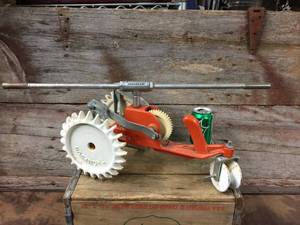 lot 19 image: Vintage Thompson Tractor Sprinkler
