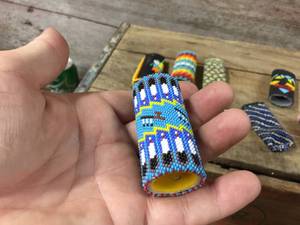 lot 44 image: Native-Looking Beaded Leather Lighter Cases