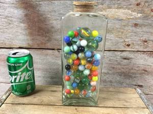 lot 59 image: Jar Vintage Marbles