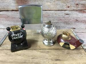 lot 234 image: Vintage Golf & Bowling Dice Theme Table Lighters