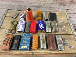 lot 237 image: Vintage Bic Style Lighter Cases