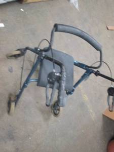 lot 357 image: rolling walker with seat and breaks...