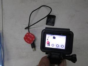 lot 69 image: GoPro 7  silver, powers on, open bo...