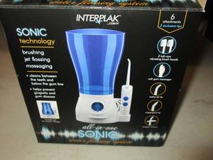 lot 94 image: Interplak Sonic Technology brushing...