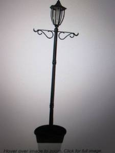 lot 101 image: SunRay Crestmont solar lamp, needs ...
