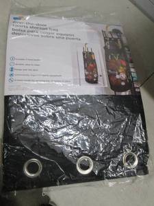lot 233 image: Over the door sports storage bag, o...