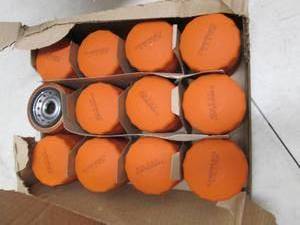 lot 254 image: box of 12 oil filters, open box...