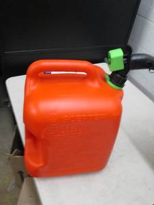 lot 258 image: Spector 5 gallon gas can, open box...