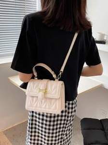 lot 3 image: Quilted Buckle Satchel Bag