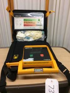 lot 20 image: MSRP $1500 Medtronic Physio Control Lifepak 500 AED Automated External Defibrillator - Test As Working However Needs Replacement Battery